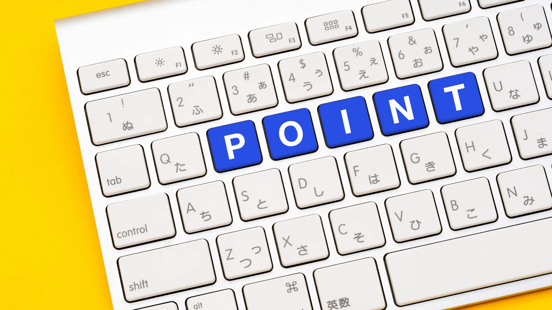 キーボードのキーに青字で「POINT」と書かれた文字。
