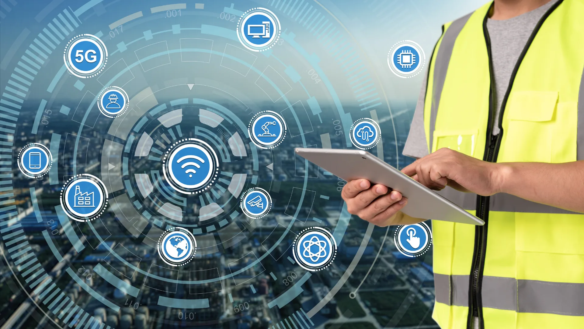 5GやIoTなど製造業DXであるスマートファクトリーを象徴するアイコンとタブレット